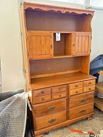 Full view of maple hutch cabinet showing upper and lower sections