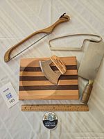 All five kitchen tools laid out on table