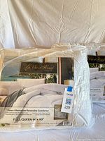 Two packaged La Vie d'Hotel comforters front view