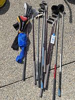 Full lot of clubs laid out showing quantity and mix