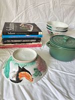 Overall lot showing cookbooks, bowls, pot
