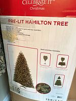 Box front showing Celebrate It Hamilton pre-lit tree details