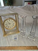 Clock and candlesticks with scale reference