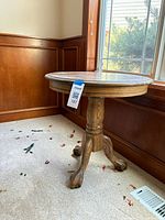 Full view of oak side table by window