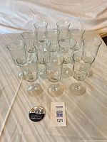 Full set of 12 stemmed goblets arranged on table