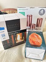 Retail boxes for fireplace, salt lamp and canister set