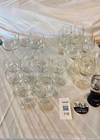 Group view of all wine glasses and aerator on table