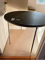 Full view of folded-out table with legs extended