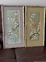 Both framed prints side by side showing size and matching frames