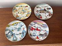 Group shot of four Christmas plates