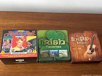 Front view of three boxed CD sets