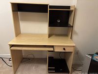 Front view showing entire desk, hutch, drawer, keyboard shelf, CPU shelf