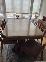 Dining table and chairs front angle