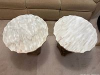 Top view of both round faux marble tables
