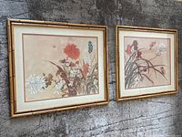 Both framed Gloria Eriksen prints hanging side by side