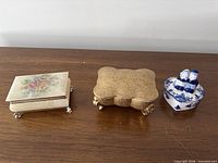 Three trinket boxes lined up