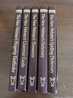 Front view of five volumes side-by-side showing titles