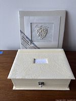 Front view of scrapbook kit and card holder box together