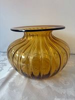 Front view showing overall form and amber ribbed glass