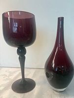 Goblet and vase side by side front view
