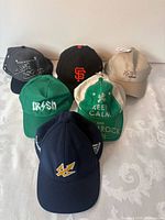 All six caps front view