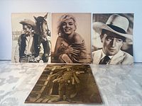 All four sepia prints displayed together