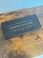 Closed product box labeled Glass Bottle Cutter
