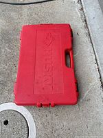 Closed red Husky case