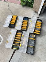 Open compartment organizers showing various screws