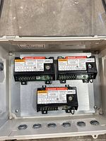 Three Honeywell modules inside enclosure