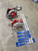 Both circular saws, extra blade, Kreg guide overall view