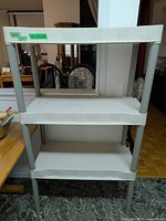 Front view of entire three-tier resin shelf