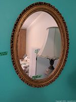 Mirror and lamp together on wall and table