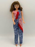 Full view of doll showing overall condition and outfit