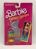 Front of sealed Barbie Fashion Starters Outfit on pink card showing contents