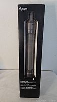 Front view of boxed Dyson extension hose
