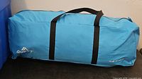 Blue Quest carry bag containing tent, full view