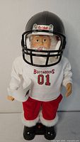 Front view of animated Santa with Buccaneers jersey and helmet