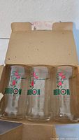 three Sapporo Ribbon glasses inside original box