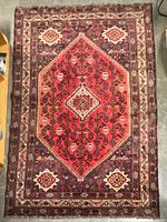 Full view of Heriz rug showing complete pattern and borders