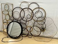 All four wall décor pieces grouped together