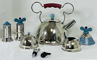Full set displayed: kettle, shakers, sugar bowl, creamer, timer, stoppers