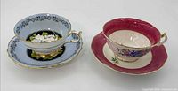 Overall view of both teacup and saucer sets