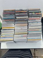Top view of stacked jewel case CDs