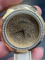 Front view showing crystal pavé dial and bezel
