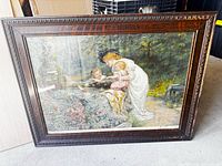 Full view of framed lithograph showing image and wooden frame