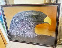 Full view of framed eagle head painting