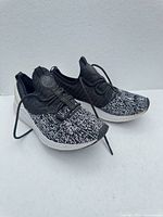 Pair of New Balance Fresh Foam LAZR v1 Sport sneakers side view