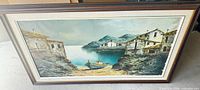 Full view of framed oil painting