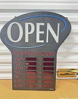 Front view showing entire Newon LED Open sign with business hours section